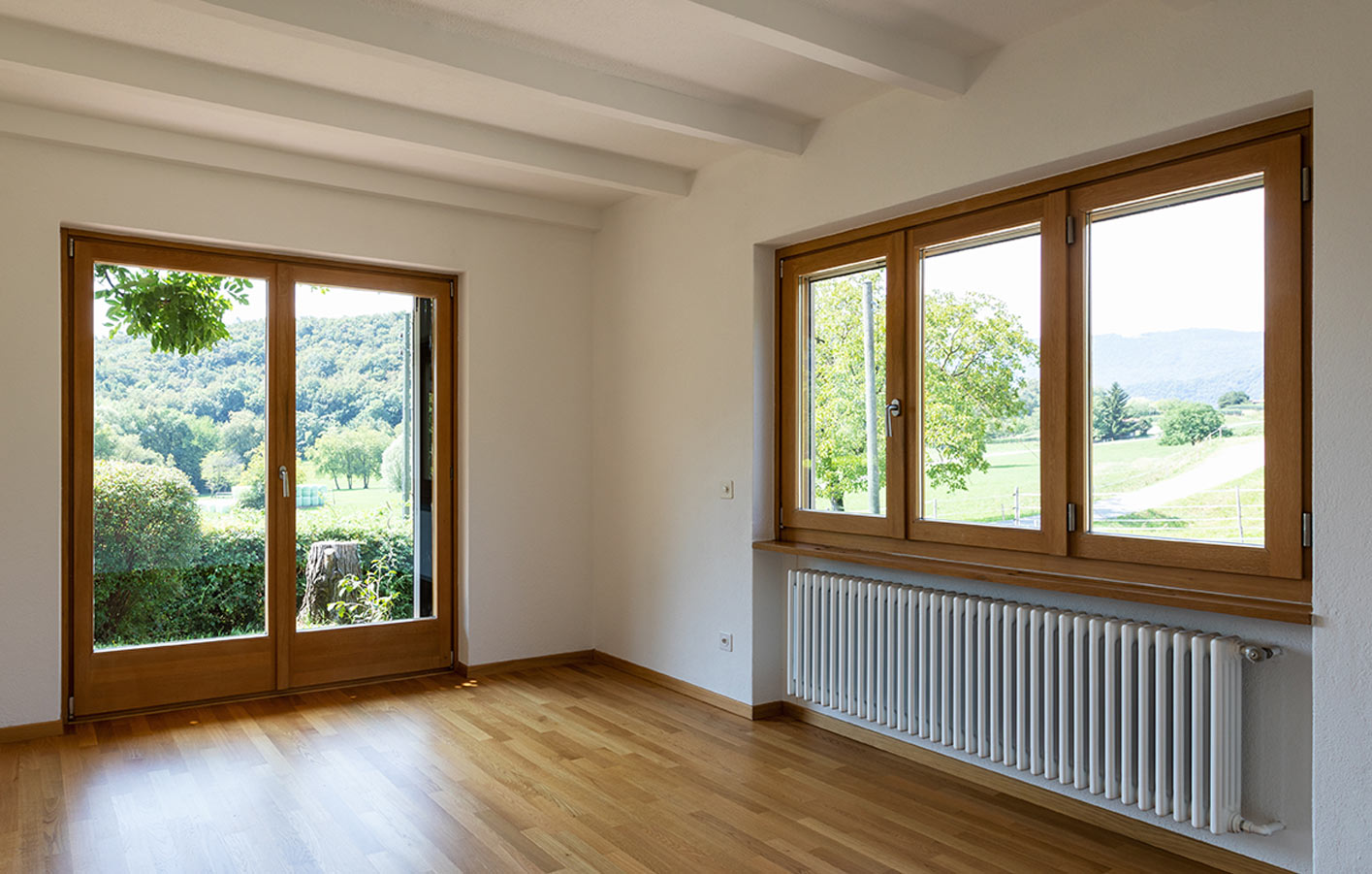 Holzfenster vom Fensterbauer in Bonn. Holz Mandt baut seit 1947 Holzfenster in der Region Köln-Bonn ein. Lieferung und Montage für Fenster aus Holz in Troisdorf, St. Augustin, Siegburg, Köln, Bornheim, Niederkassel und Hennef (Sieg)